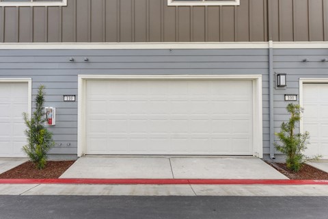 Exterior of the driveway and two car garage.
